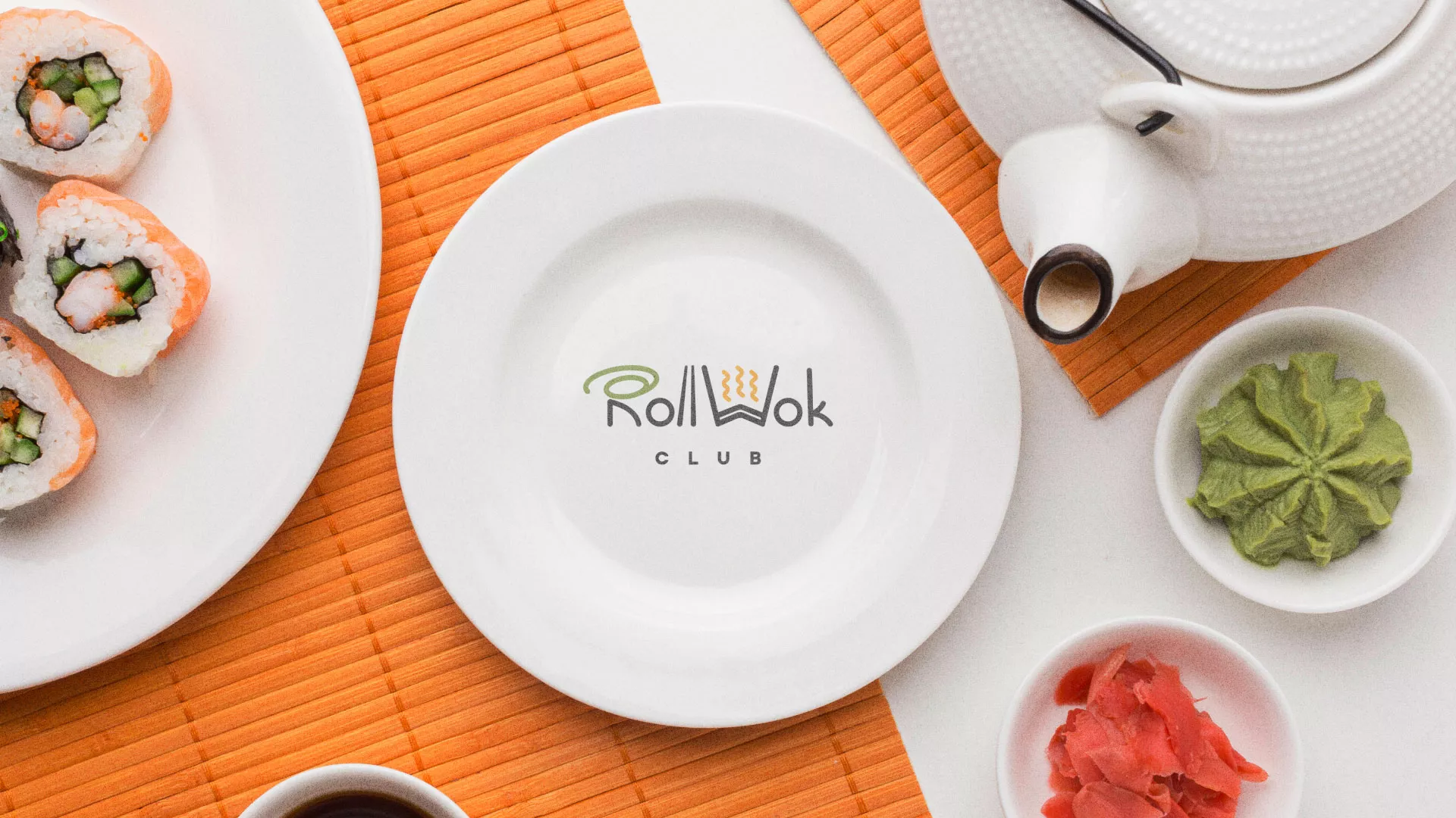 Разработка логотипа и фирменного стиля в Верхнем Тагиле для суши-бара «Roll Wok Club» Разработка логотипа и фирменного стиля в Верхнем Тагиле для суши-бара «Roll Wok Club»